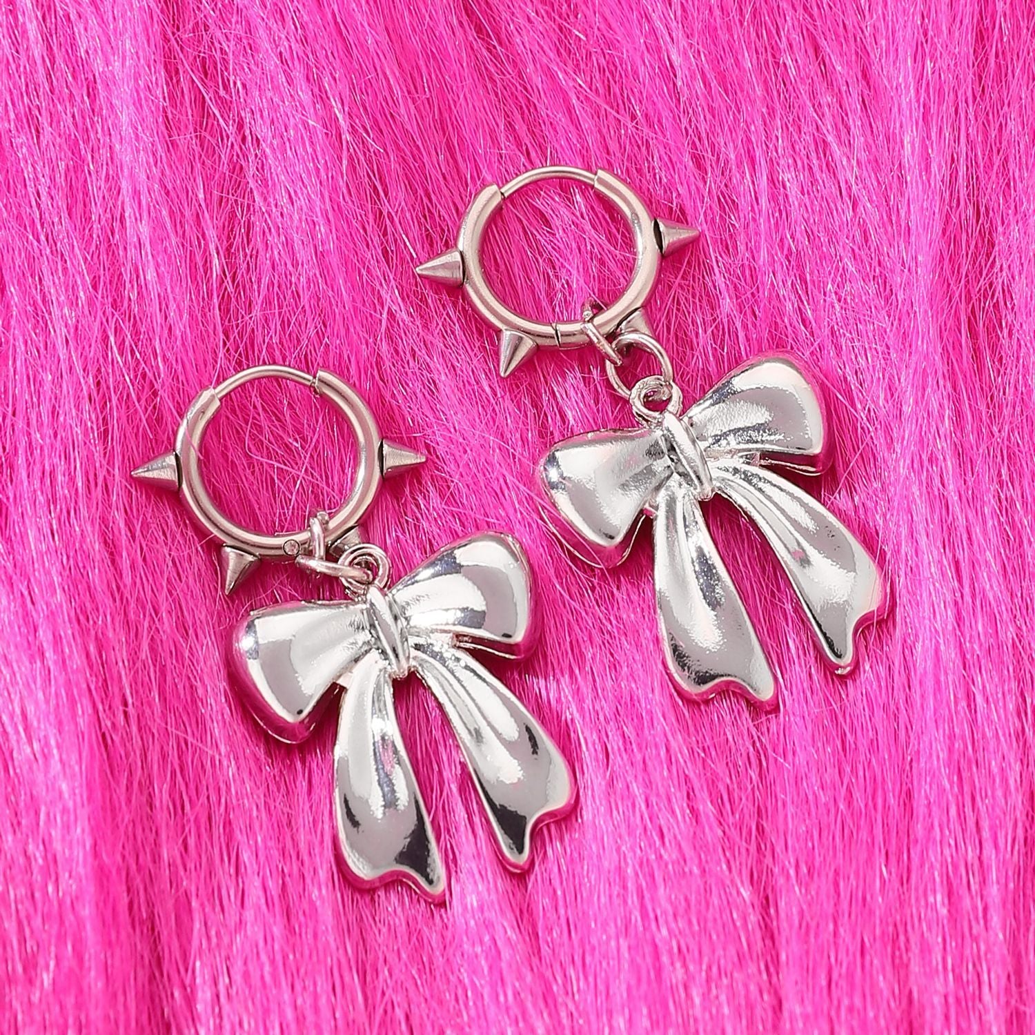 Cute Swirls Bowknot Rivet Earrings